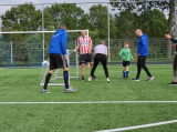 Laatste training S.K.N.W.K. JO7-1 (partijtje tegen de ouders) van maandag 27 mei 2024 (64/180)